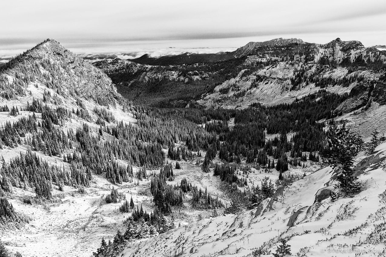 A black and white photograph of McNeeley Peak overlooking Huckleberry Basin after an early Autumn snow at Mount Rainier National Park, Washington.