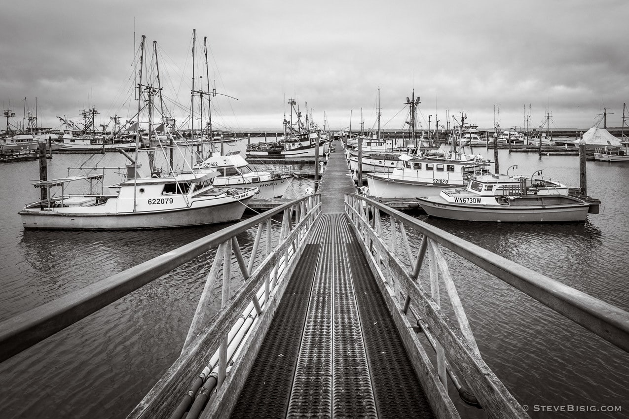 A black and white photograph of the marina and harbor at Westport, Washington.