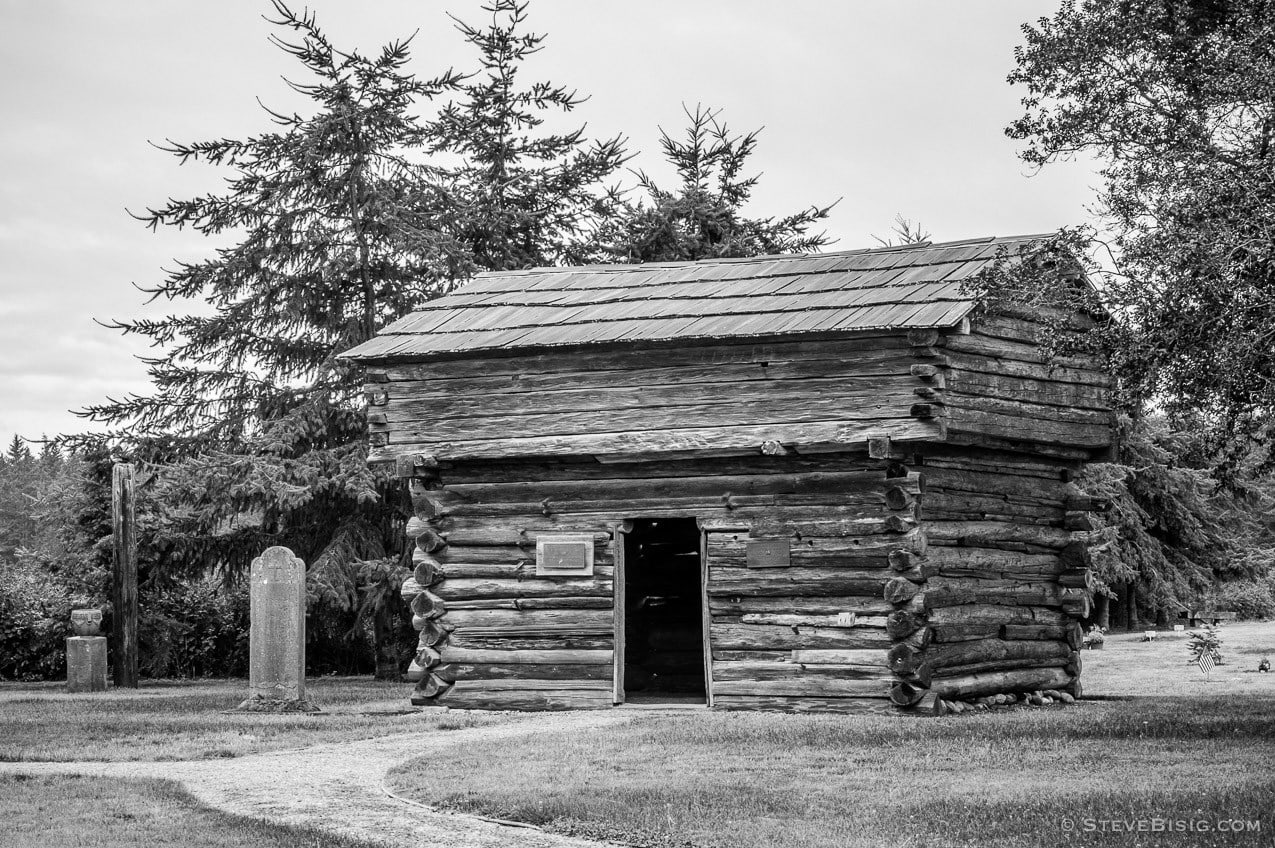 A black and white photograph of the Davis Blockhouse on Whidbey island near Coupeville, Washington.