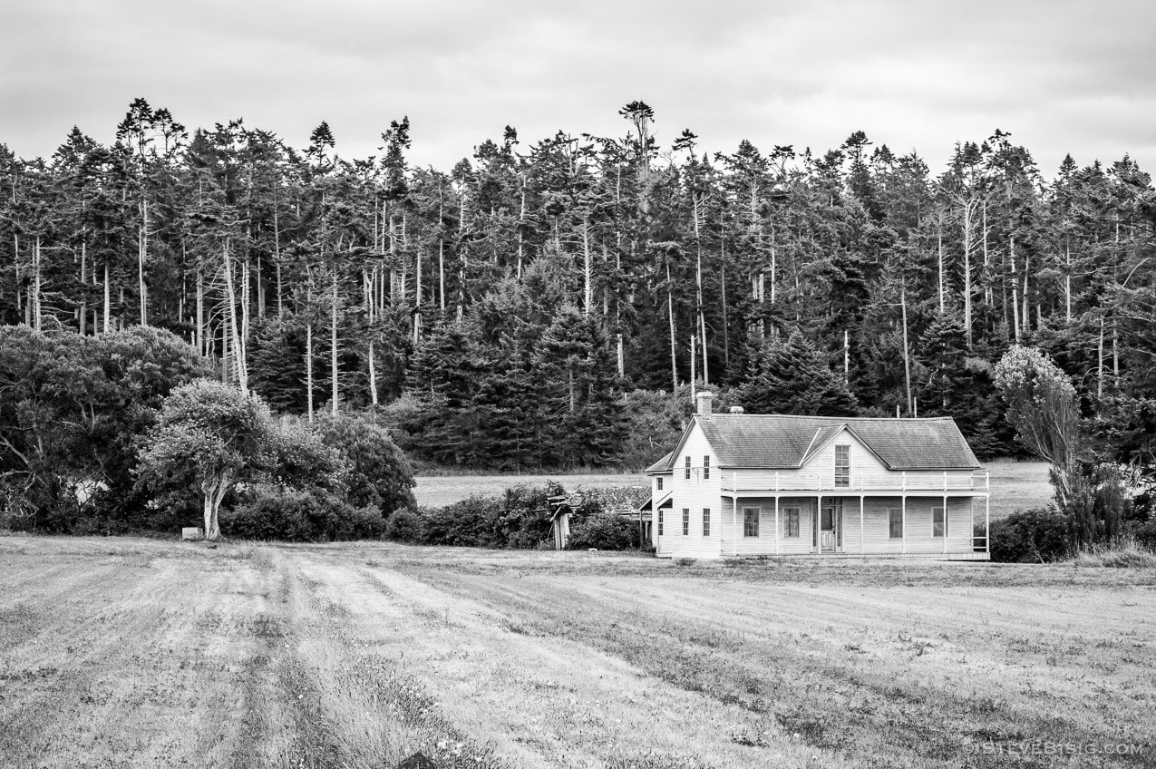 A black and white photograph of the Ferry House on Whidbey Island near Coupeville, Washington.