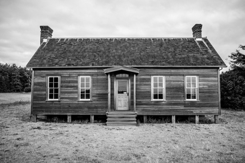 A black and white photograph of the home of Jacob Ebey on Whidbey Island near Coupeville, Washington.