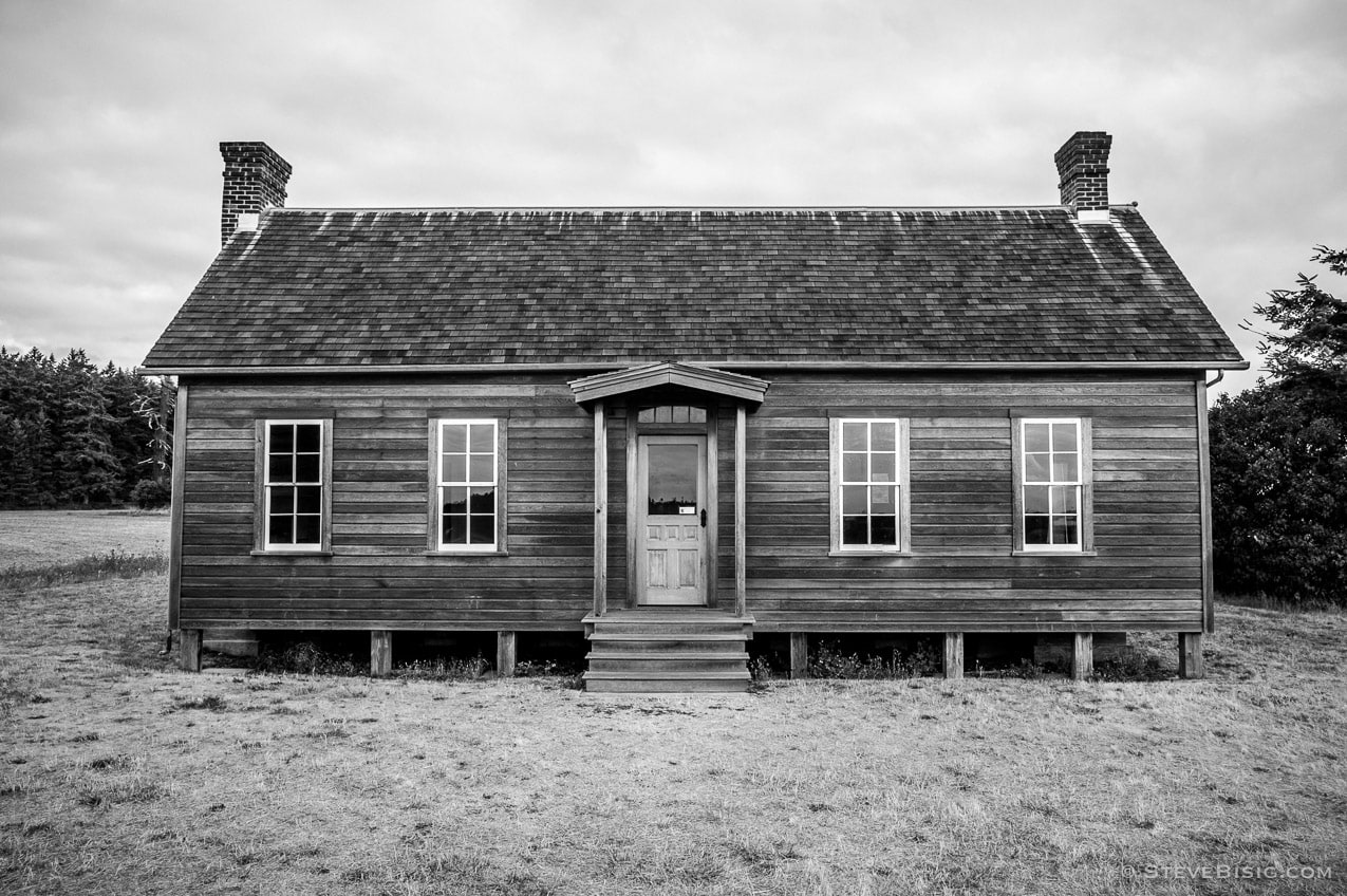 A black and white fine art photograph of the home of Jacob Ebey on Whidbey Island near Coupeville, Washington.