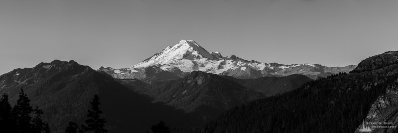 A black and white panoramic landscape photograph of Mount Baker as seen from the Yellow Aster Butte trail in Whatcom County, Washington.