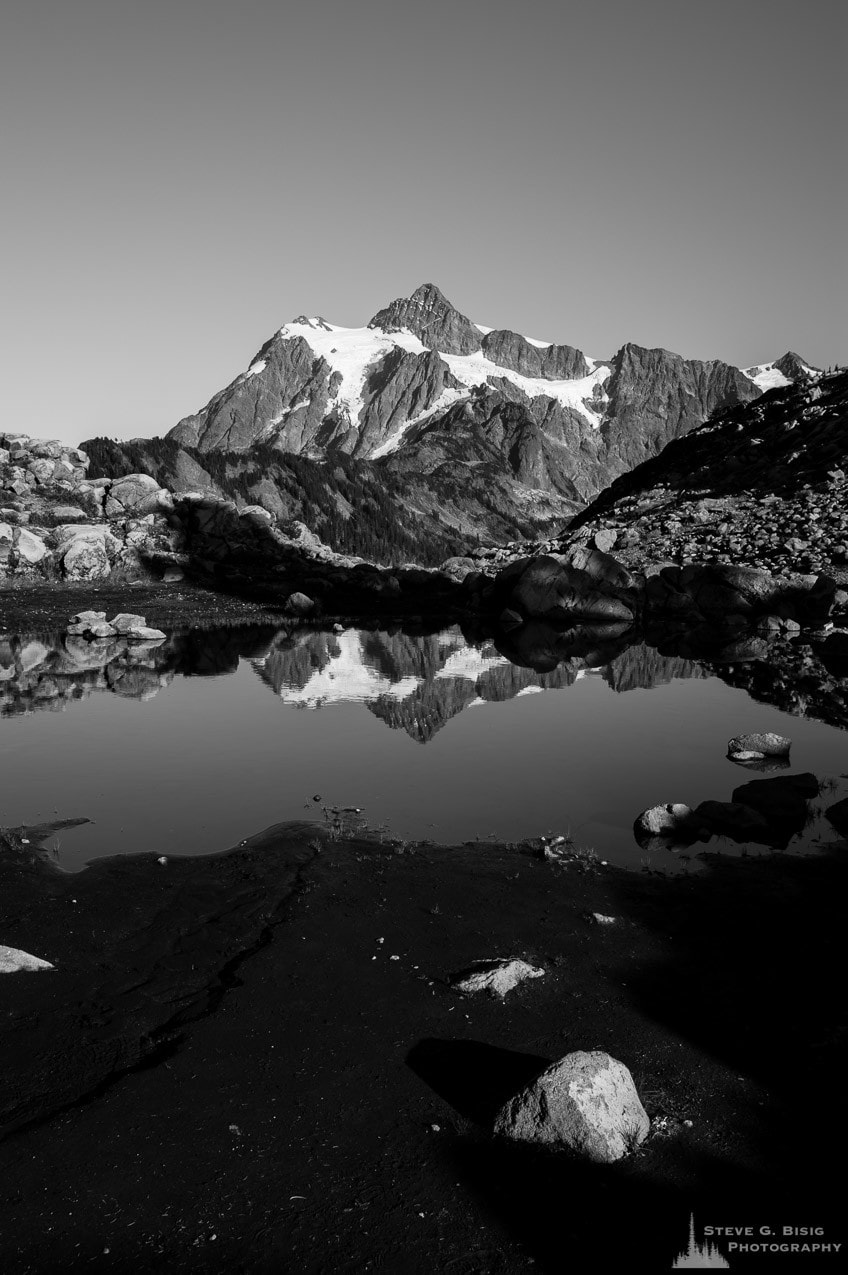 A fine art black and white landscape photograph of Mount Shuksan as viewed from Artist Point near Mount Baker Ski Area, Washington.