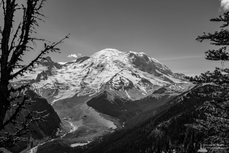 A black and white landscape photograph of Mount Rainier from Emmon's Vista in the Sunrise area of Mount Rainier National Park, Washington.