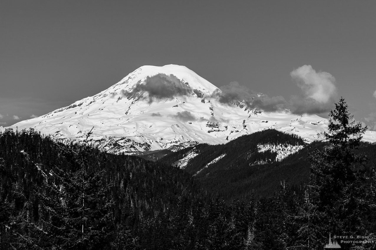 A black and white landscape photograph of Mount Rainier as viewed from US12 in Lewis County near White Pass, Washington.Mount Rainier, Lewis County, Washington