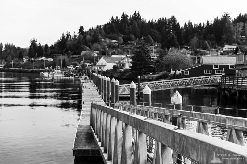 A series of black and white photographs captured along the banks of the Willapa River in downtown South Bend, Washington.