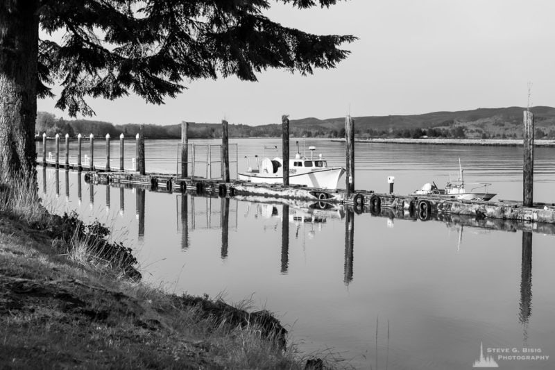 A series of black and white photographs captured along the banks of the Willapa River in downtown South Bend, Washington.