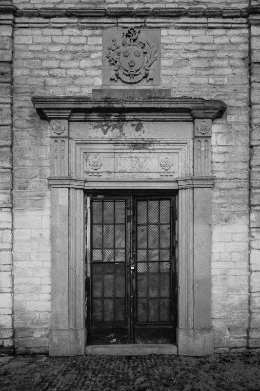 A black and white photograph of the La Chapelle Saint-Boniface on the grounds of the Abbaye de La Cambre in Brussels, Belgium.