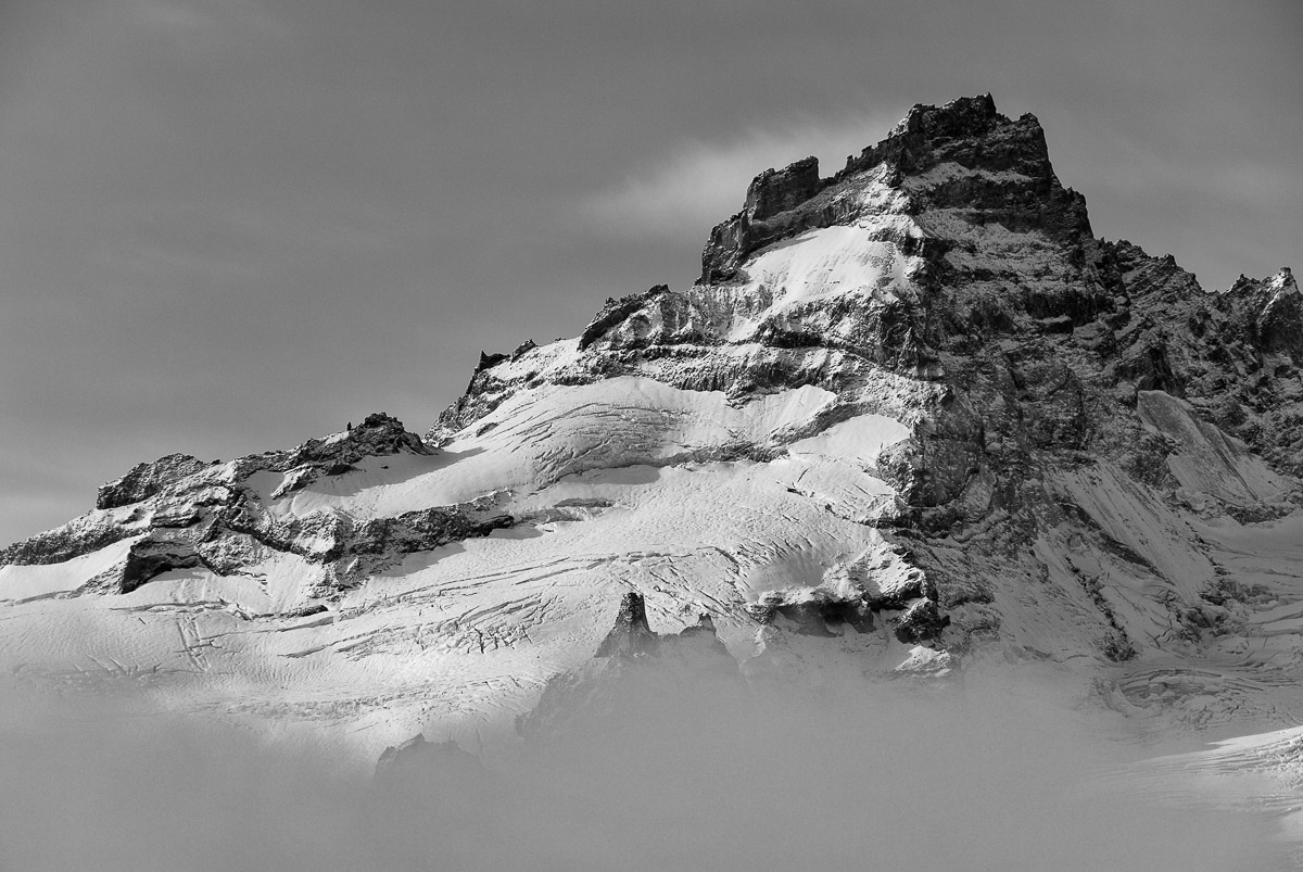 Little Tahoma Peak just above the clouds on an early autumn day, Mount Rainier National Park, Washington.