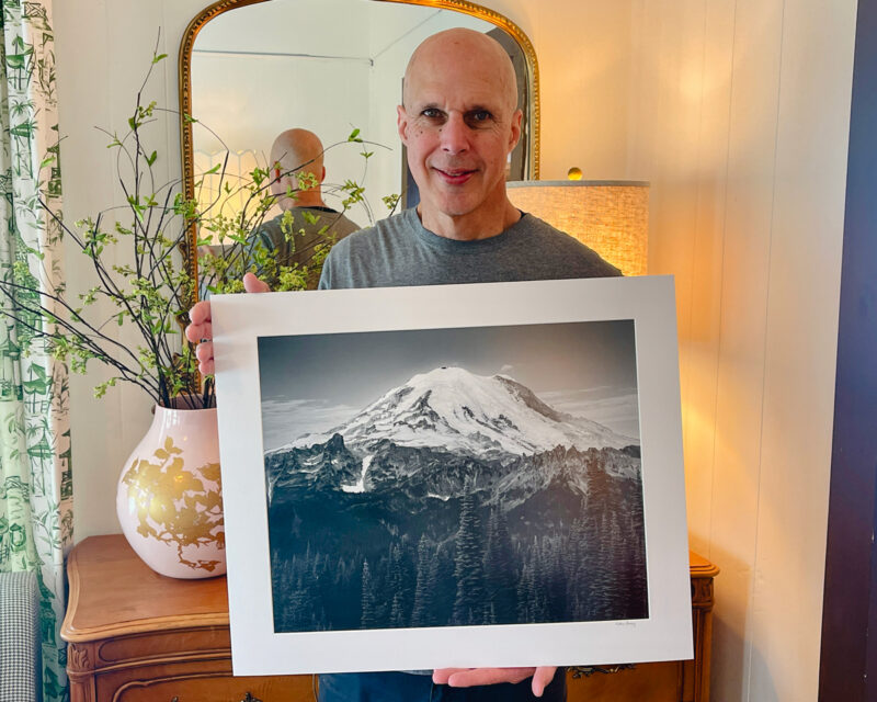 A black and white landscape photograph of Mt. Rainier as viewed along the Naches Peak Loop trail near Chinook Pass, Washington.