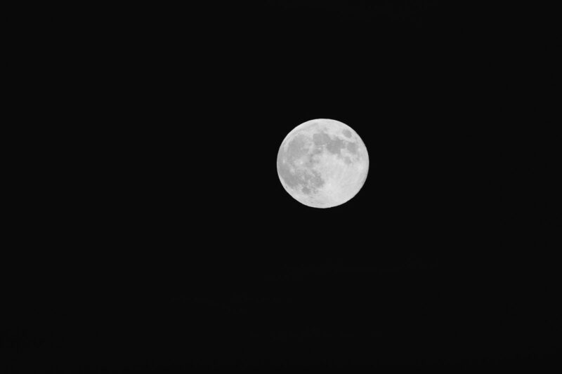 Named for the time of year when beavers prepare for winter, the Beaver Moon graced the sky despite clouds thwarting my plan to photograph it rising over the Coast Range near Astoria, Oregon. I finally captured this image after it climbed higher above the horizon.
