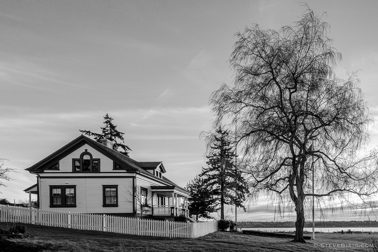 A black and white photograph of the light house keepers house at Browns Point Washington.